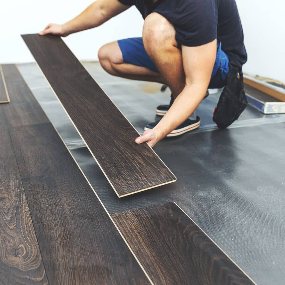 laminate flooring - flooring contractor installs new floor